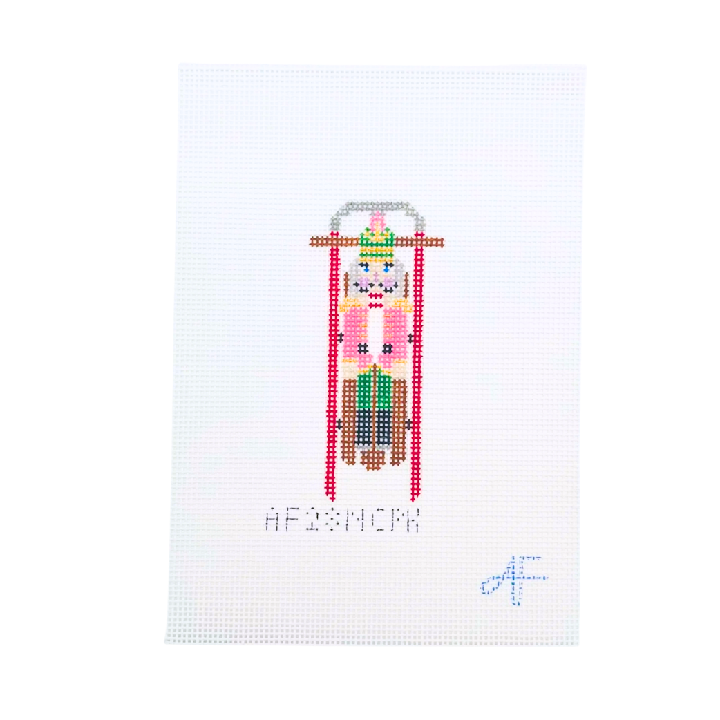 Sled with Pink Nutcracker Needlepoint Canvas
