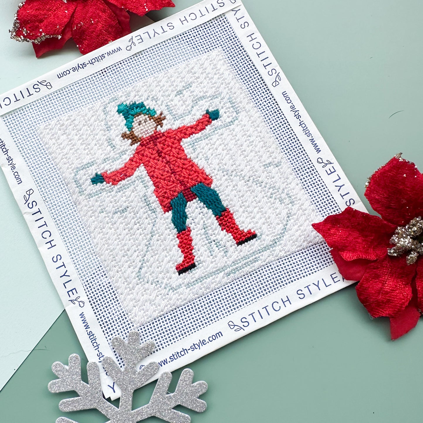 Winter Village- Girl Making Snow Angel